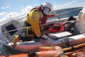 Lifeboat crews rescue the stricken rower (Pic: Dunbar RNLI)