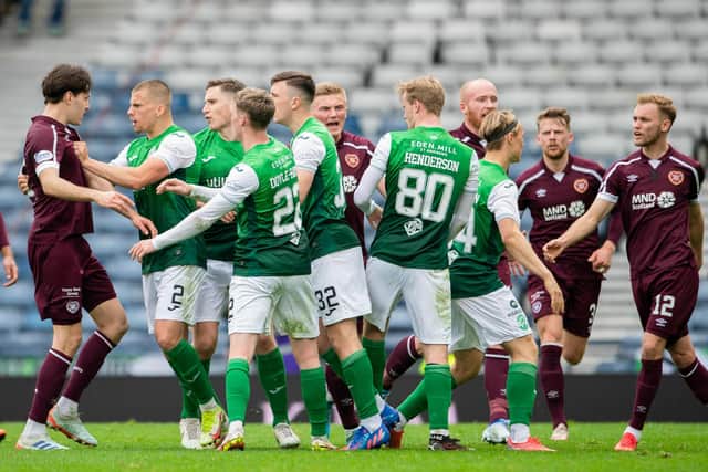 Things get heated between the Hearts and Hibs players at Hampden