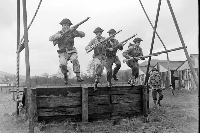 Royal High School Cadets take on an assault course at Cultybraggan Camp, near Crieff, in April 1960.