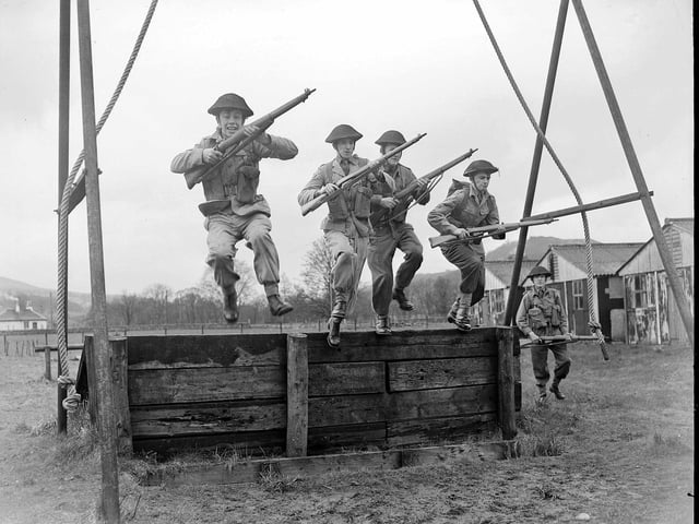 Royal High School Cadets take on an assault course at Cultybraggan Camp, near Crieff, in April 1960.