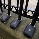 Stock photo of Air BnB key boxes on railings at Upper Bow, Edinburgh, by Lisa Ferguson.