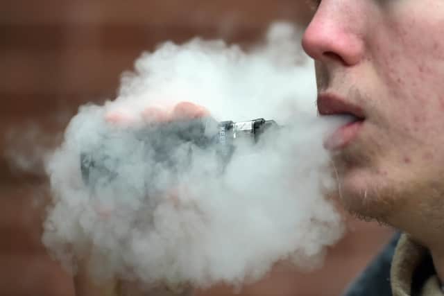 A man vaping. Scots think Holyrood should encourage cigarette smokers to switch to vapes, a poll has suggested. Picture: Nicholas.T.Ansell/PA Wire