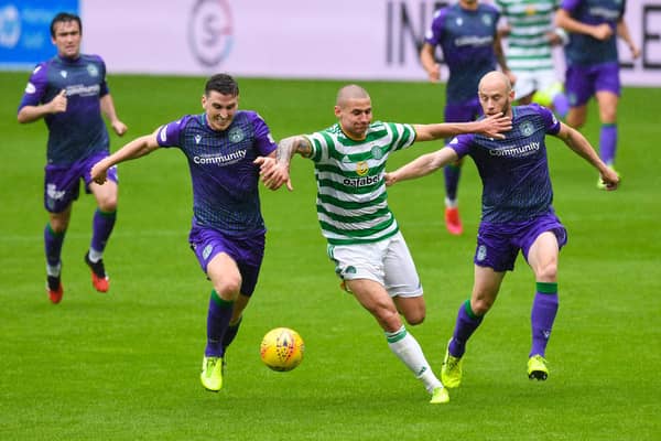 David Gray and Paul Hanlon keep tabs on Patryk Klimala during the pre-season friendly between Celtic and Hibs at Celtic Park