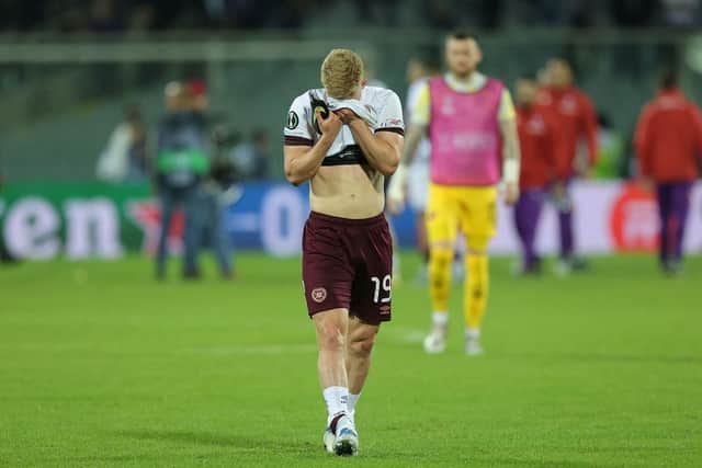 Alex Cochrane demonstrates his frustration after Hearts are thumped 5-1 by Fiorentina in Florence. Picture: SNS