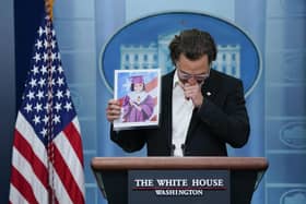 Actor Matthew McConaughey holds an image of Alithia Ramirez, 10, who was killed in the mass shooting at an elementary school in Uvalde, Texas, as he speaks during a press briefing at the White House, Tuesday, June 7, 2022, in Washington. (AP Photo/Evan Vucci)