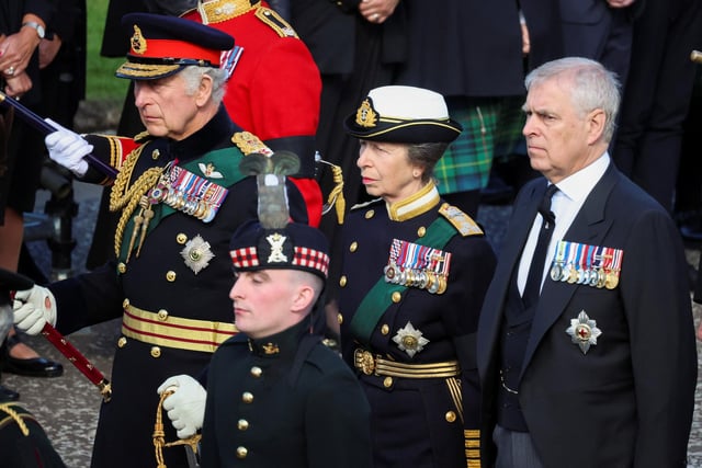 (Left to right) King Charles III, the Princess Royal and the Duke of York walk behind Queen Elizabeth II's coffin during the procession from the Palace of Holyroodhouse to St Giles' Cathedral, Edinburgh. Picture date: Monday September 12, 2022.
