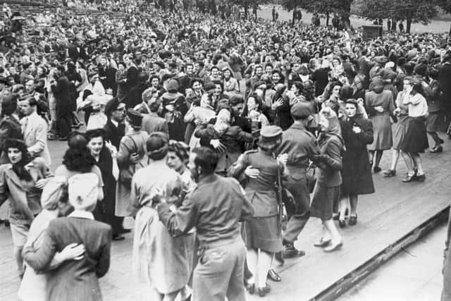 Hundreds of couples dancing at the Ross bandstand, Edinburgh, part of the Capital's victory celebrations at the end of World War II.