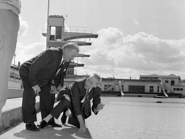 Mr J Coutts and Mr J C Forbes examine the discoloured water at Portobello Outdoor Swimming Pool in 1965.