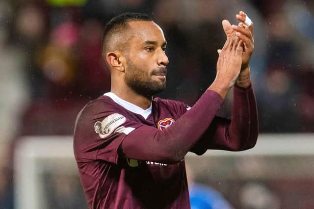 Loic Damour salutes the Hearts support after the 1-0 win over Rangers. Pic: SNS