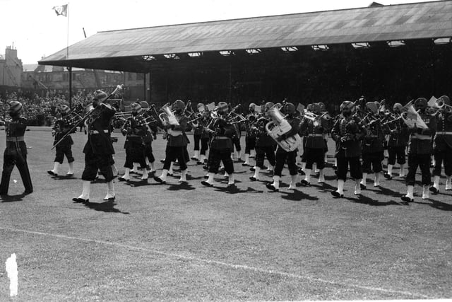 The Pies and Drums of the Indian 61st Cavalry Regiment, who were appearing at the Edinburgh Military Tattoo, are pictured performing at half-time in August 1962.