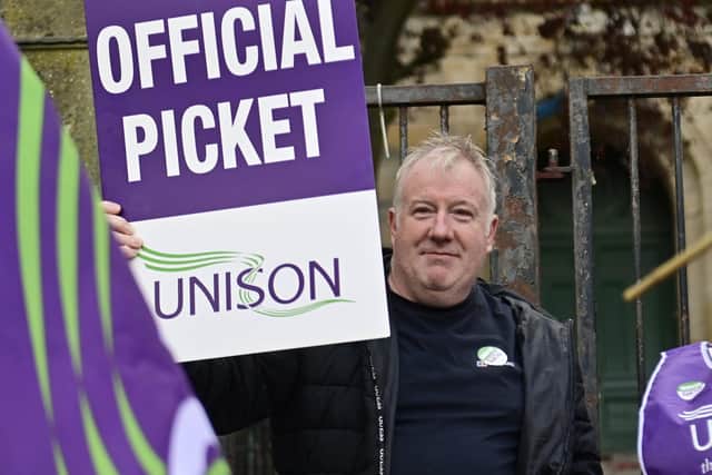 A one-day school strike by Unison members in Edinburgh and three other Scottish council areas have been suspended while the union holds a ballot on an improved pay offer.