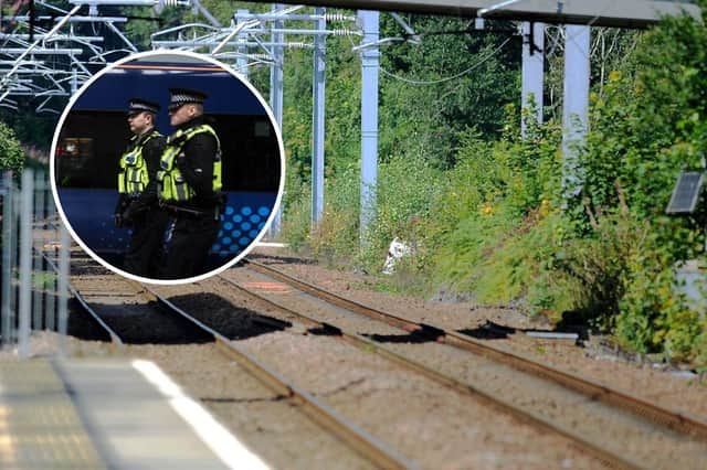 A person died after being hit by a train on the line between Edinburgh Waverley and Glasgow Queen Street.