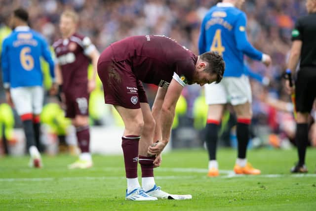 John Souttar cuts a dejected figure at full time but was the best Hearts player on the pitch in his final match in maroon. Picture: Sammy Turner / SNS Group