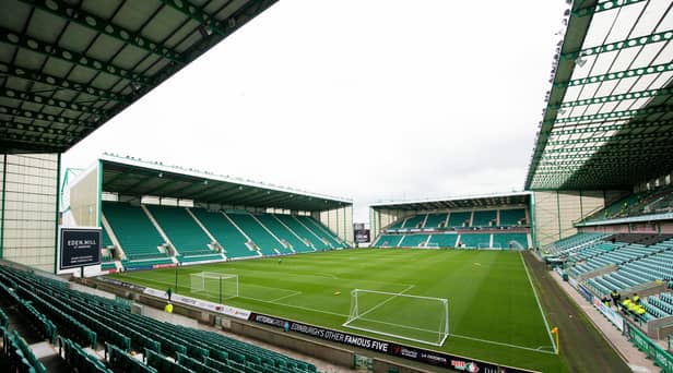 A general view of Easter Road - the two black adverts will be replaced by the big screens