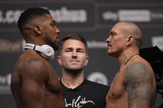 Britain's Anthony Joshua, left and Oleksandr Usyk of the Ukraine pose for the media during the weigh-in for their upcoming boxing match at the O2 Arena in London, Friday.(Image: AP Photo/Mat Dunham)