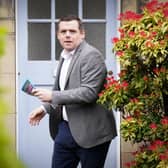 Scottish Conservative leader Douglas Ross in Davidson Mains, Edinburgh, on the campaign trail for Scottish Conservatives ahead of the local government elections. Picture date: Wednesday April 13, 2022.