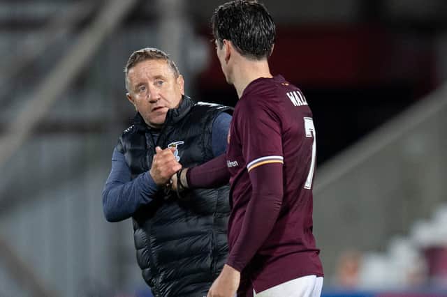 John Robertson with Jamie Walker at full-time at Tynecastle.
