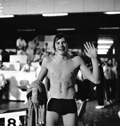 Scottish swimmer David Wilkie celebrates after winning the 200m breaststroke  during the Commonwealth Games in Edinburgh, July 1970