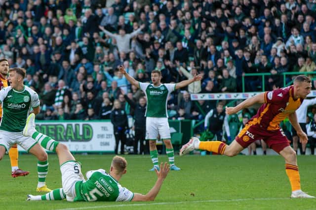 Motherwell's Connor Shields pulls down Ryan Porteous and gets a straight red card for a professional foul. Picture: SNS