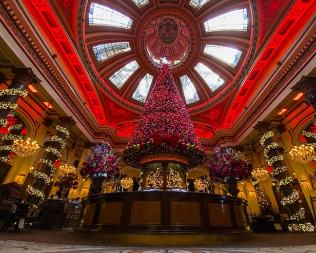 The Dome on George Street, Edinburgh, has been named the best place in the UK to enjoy afternoon tea. It is pictured in December 2020 with its popular Christmas decorations lighting up the venue. Photo by Lisa Ferguson.





COVID19, CORONA VIRUS - General Manager Steve Hall of The Dome, Edinburgh shows us theis years Christmas decorations.  They hoping restrictions are eased soon and can re-open hopefully soon and before CHristmas