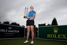 Hannah Darling poses with the trophy following her weekend victory in the R&A Girls Amateur Championship at Fulford. Picture: R&A via Getty Images.