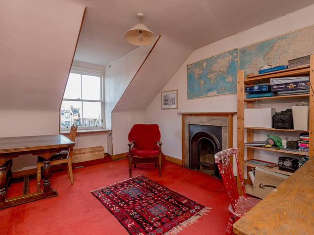 One of the property's four double bedrooms on the first floor, currently used as a spare room.