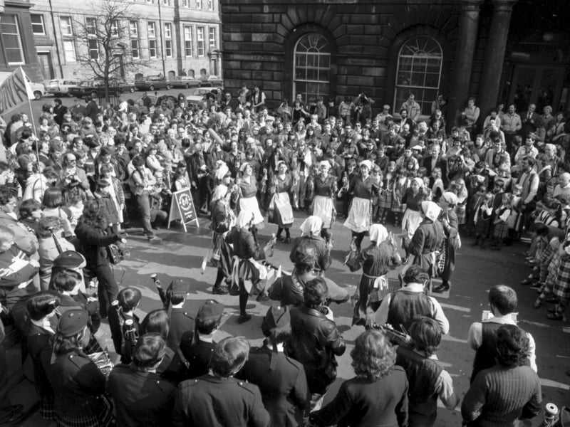 The Sandgate Morris dancers at the Mercat Cross during Edinburgh Folk festival March 1982.