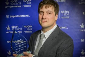 Hamish McKnight with his SportScotland COV award for named High Performance Coach. Photo by Alan Peebles