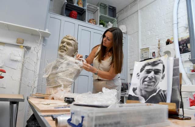 Leyland sculptor Stephanie Jane Matthews working on her collection of The Famous Five footballers from Hibs in Scotland