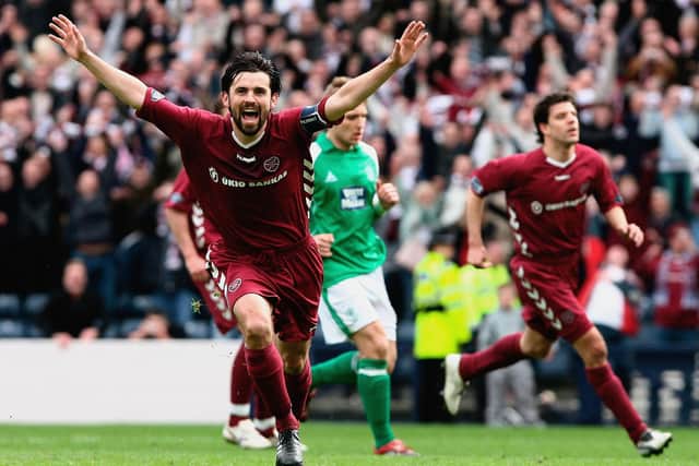 Hearts' Paul Hartley wheels away in celebration after netting against rivals Hibs at Hampden in April 2006