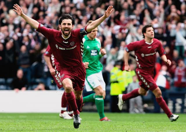 Hearts' Paul Hartley wheels away in celebration after netting against rivals Hibs at Hampden in April 2006