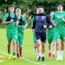 Kos Sadiki (#44) trains with the Hibs first team squad at East Mains