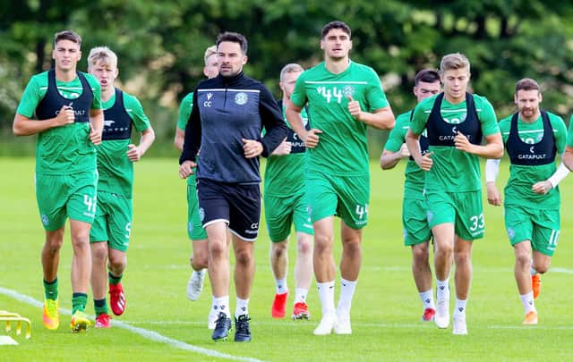 Kos Sadiki (#44) trains with the Hibs first team squad at East Mains