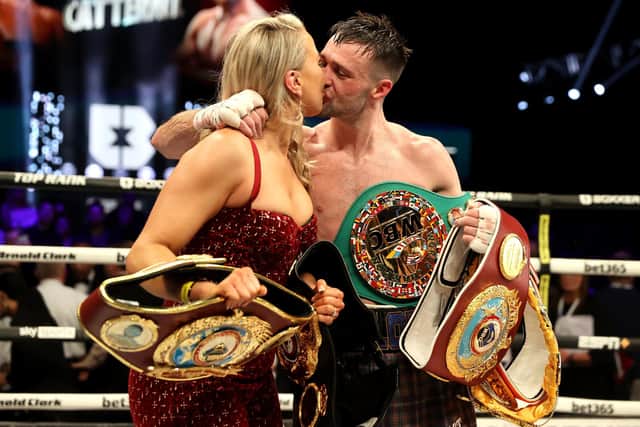 Josh Taylor celebrate with Danielle Murphy after victory in the light welterweight bout against Jack Catterall