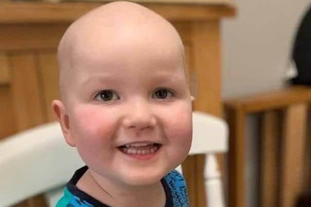 Logan recovering after treatment for cancer