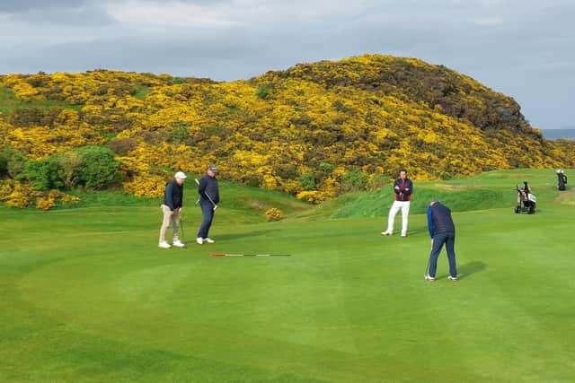 Watsonians player Greg Nicolson putts on the first green at the Braids in the last of the eight first-round ties against Bass Rock. Picture: National World.