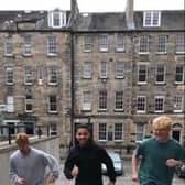 Three of the 24 relay runners training outside McEwan Hall (from left to right) Michael Lynch, Lucien Staddon Foster and Sam Doble Thomson.