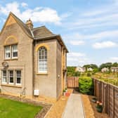 On the market at offers over £430,000, 2 Duddingston Road is a delightful detached sit alone three bedroom house arranged over two floors.
