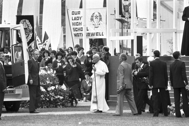 Pope John Paul II steps up to the microphone to address the crowd at Murrayfield Stadium.