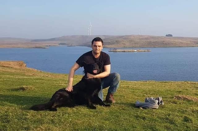 Ross Murdoch and his German Shepherd dog Alba at the Harelaw fishery.