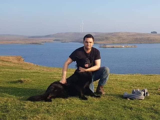Ross Murdoch and his German Shepherd dog Alba at the Harelaw fishery.