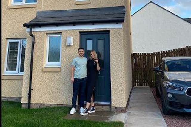 Wayne Sproule and his partner Chelsea Youngson, both 29 years old, are celebrating as they have just received the keys to their first property