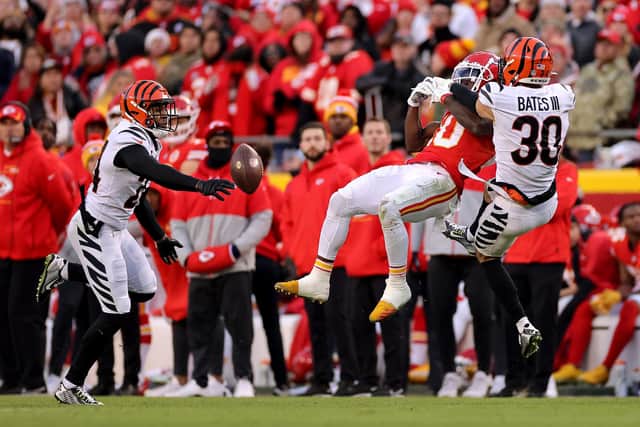 Safety Vonn Bell #24 of the Cincinnati Bengals intercepts a pass intended for wide receiver Tyreek Hill #10 of the Kansas City Chiefs during overtime of the Bengals 27-24 win in the AFC Championship Game at Arrowhead Stadium on January 30, 2022 in Kansas City, Missouri. (Image credit: David Eulitt/Getty Images)