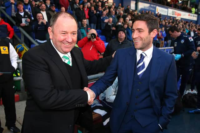 Johnson, left, with father Gary when Oldham Athletic met Yeovil Town in 2013