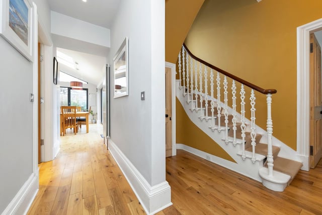 The property is entered via an entrance vestibule which leads into a broad reception hall with a stair case rising to the first floor landing.