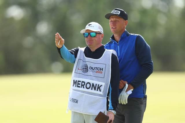 Eskbank man Stuart Beck picks out a line for his boss, Pole Adrian Meronk, during the recent Dutch Open at Bernardus Golf. Picture: Dean Mouhtaropoulos/Getty Images.