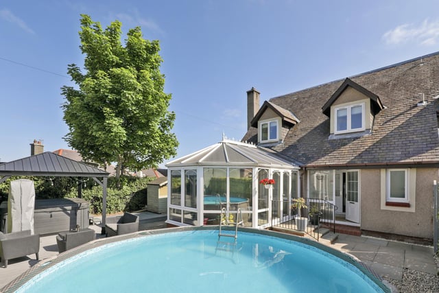 This property comes with a swimming pool and jacuzzi in the garden, perfect for sitting outside in the sun.