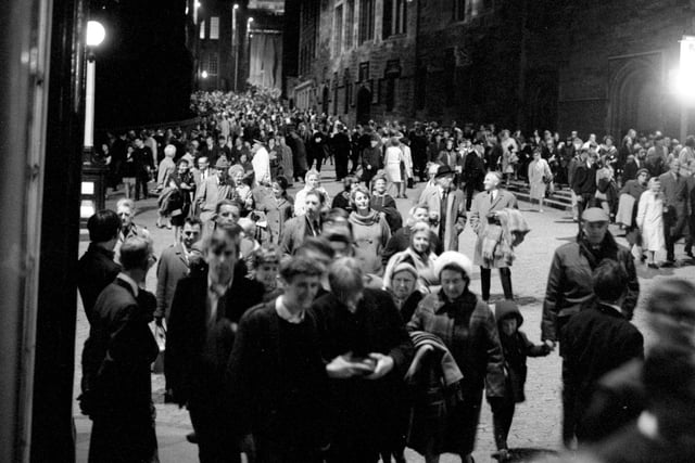 Crowds making their way down the Royal Mile after a performance of the Edinburgh Military Tattoo in August 1966.