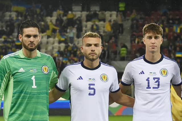 Debutant Ryan Porteous, centre, lines up for Scotland ahead of the 0-0 draw with Ukraine in Poland