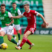 Hibernian's Melker Hallberg and Aberdeen's Lewis Ferguson during Sunday's match at Easter Road. (Photo by Mark Scates / SNS Group)